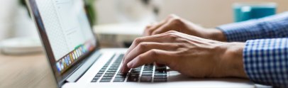 Image of a person looking for an online loan